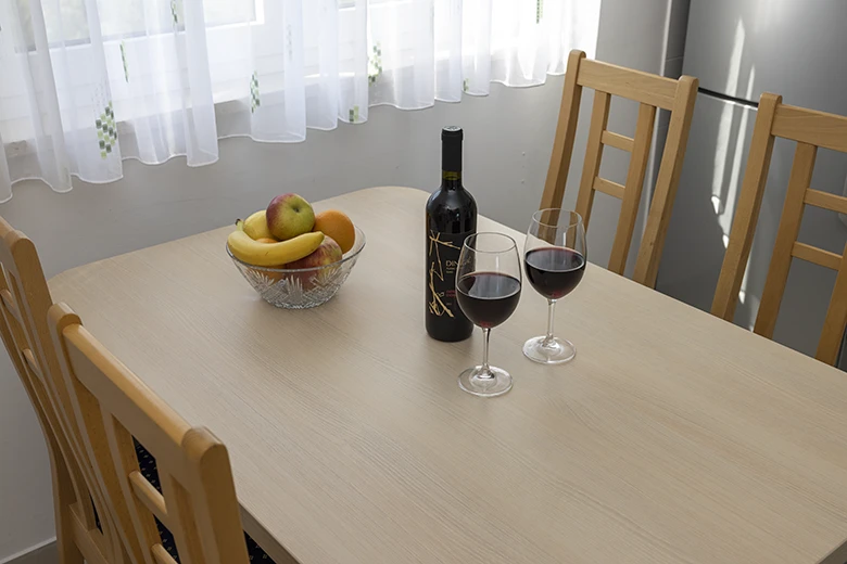 apartments Adriatic, Igrane - dining table with wine on it