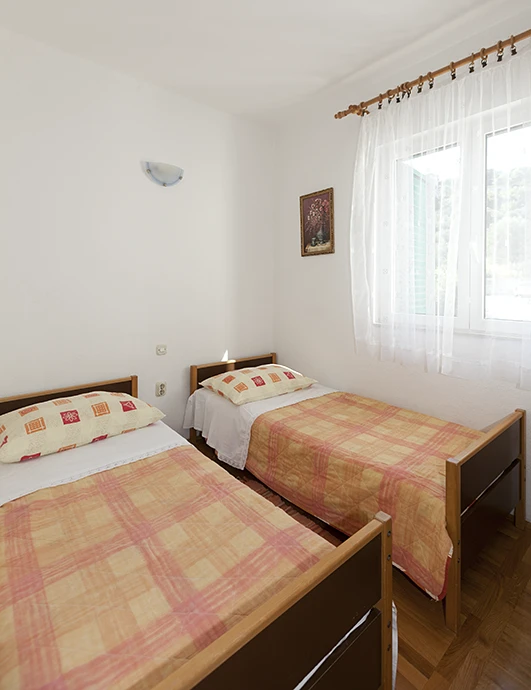 apartments Tončika, Igrane - bedroom