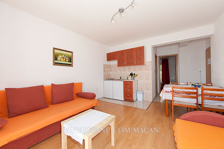 apartment Macan, Igrane - living room with 3 additional beds